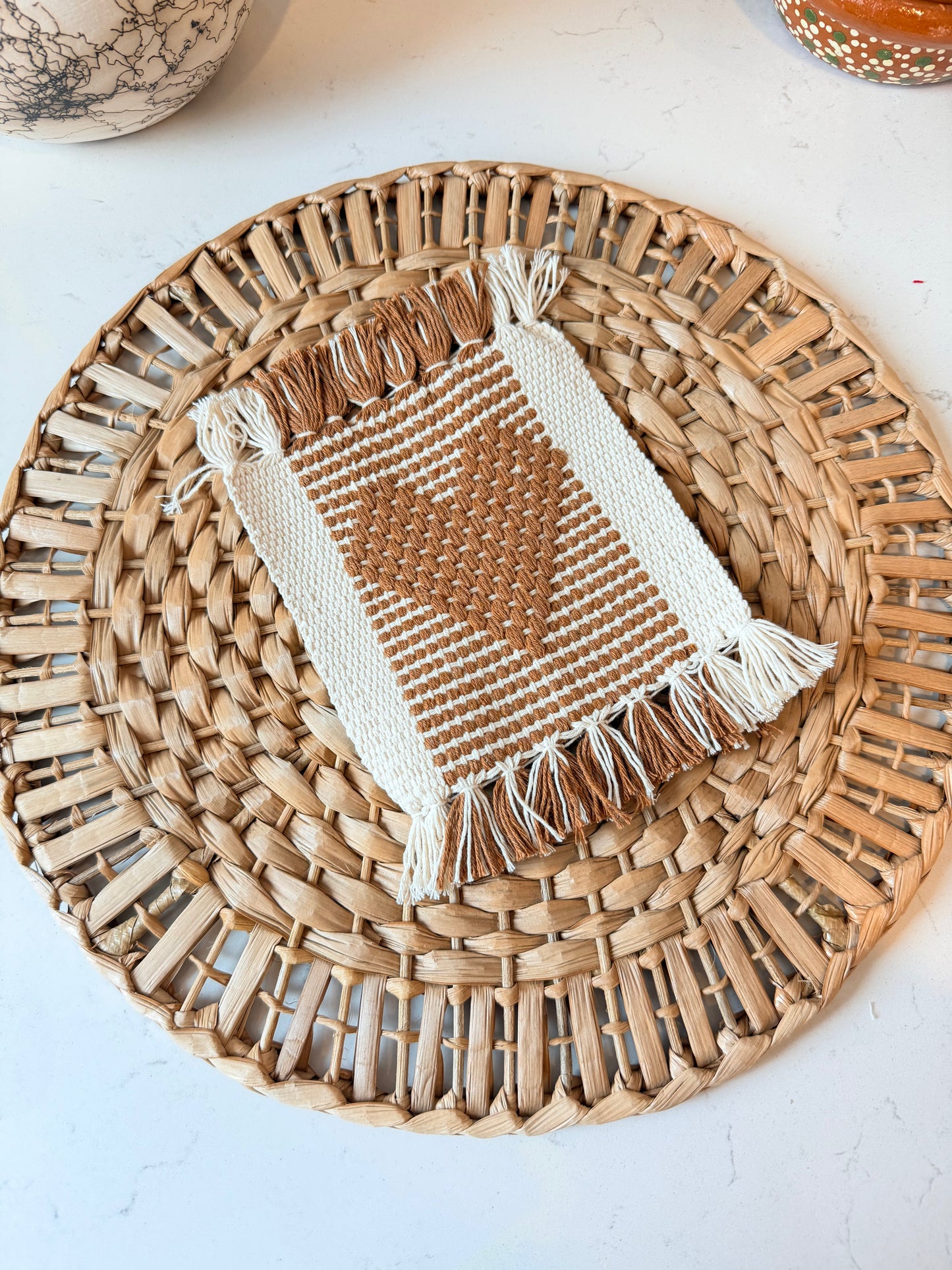 Golden brown waist loom coaster