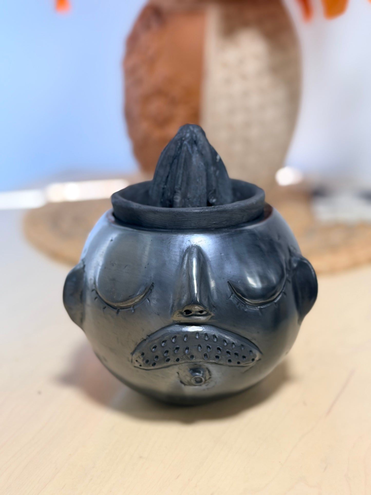 Exprimidor barro negro