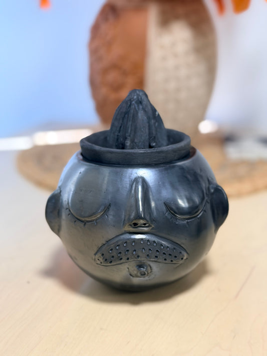 Exprimidor barro negro