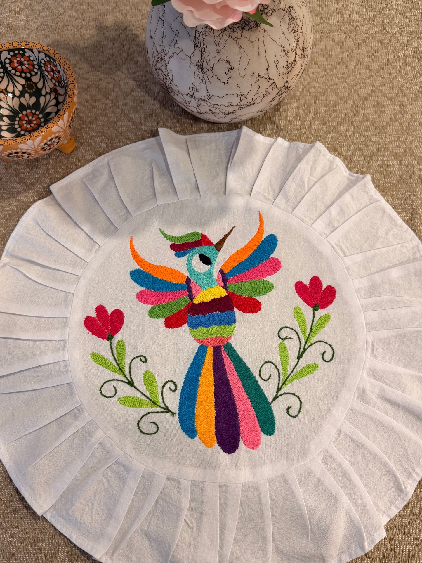 Colores Round embroidered table accent