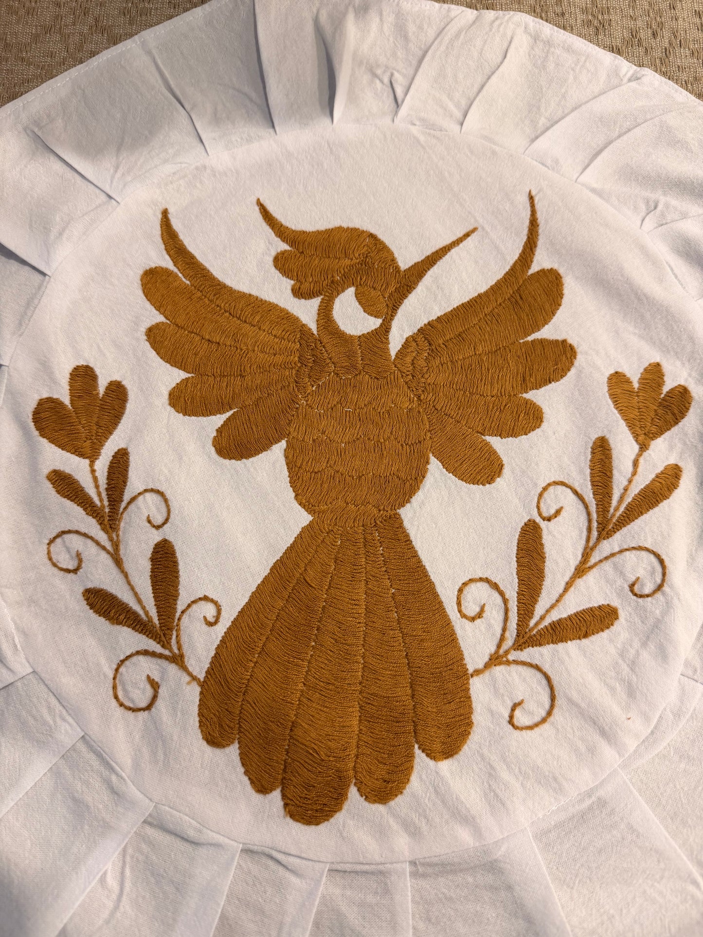 Golden Round embroidered table accent