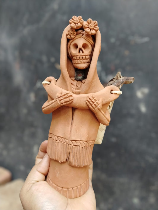 Ofelia (basket in the back & Rebozo, handmade Oaxacan skull)